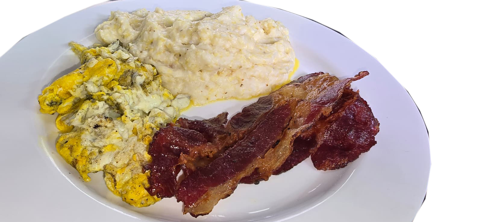 Grits eggs and beef bacon